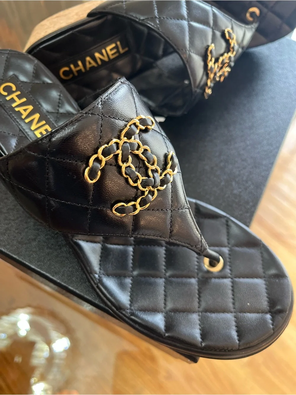 CHANEL Black Quilted Leather Thong Sandals with Gold Chain CC